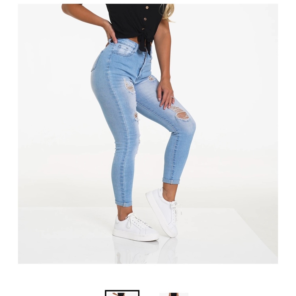 NVGTN Navi shaped light wash ripped jeans Size M NEW